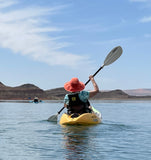 Wrapping up a bird-watching tour with Dig Paddlesports at Quail Creek State Park in Hurricane, UT, this paddler comfortably made it back to shore with that fun, salmon-colored sun hat.