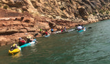 Guided Tour at Dig Paddlesports - Feelfree Coronas in use as tandems of choice for families and friends prepping for a fun hour of cliff jumping at Quail Creek State Park in Hurricane, Utah.